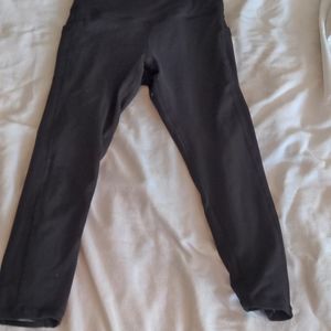 Black capri leggings with crisscross calf detail